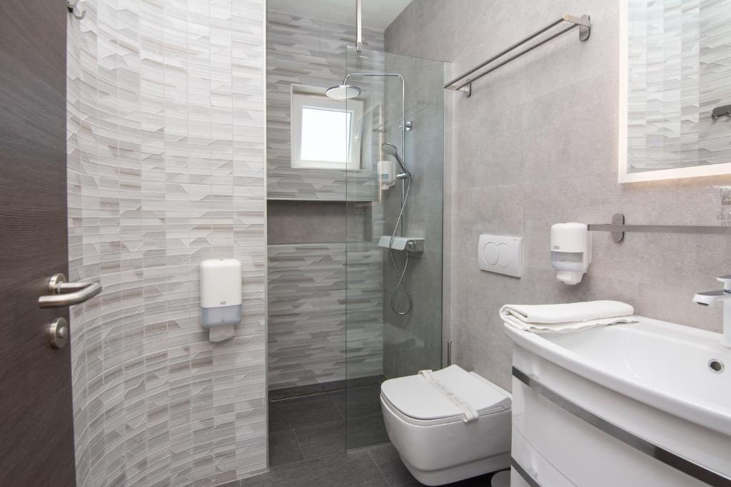 Kopalnica v nastanitvi Hotel Vicko