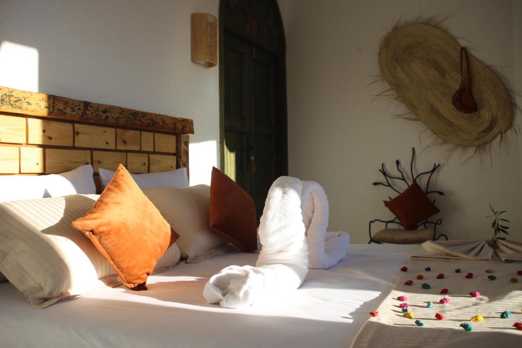 Cama o camas de una habitación en Haven Hills Social Club