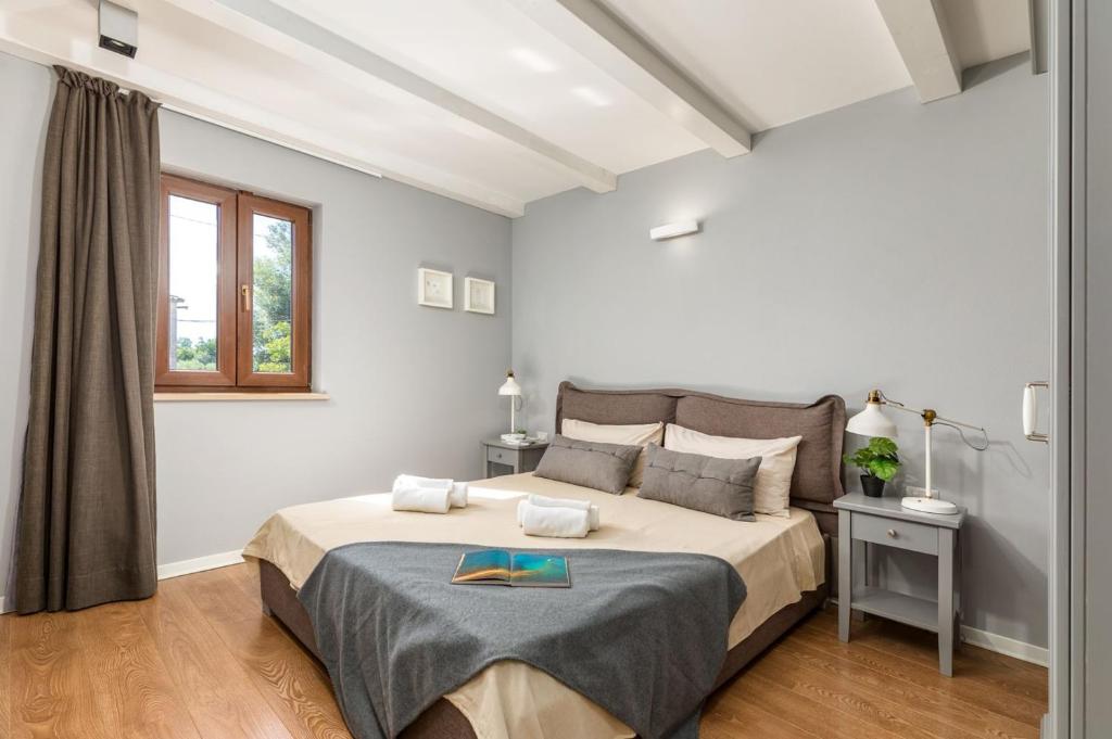 Postel nebo postele na pokoji v ubytování Villa Vira