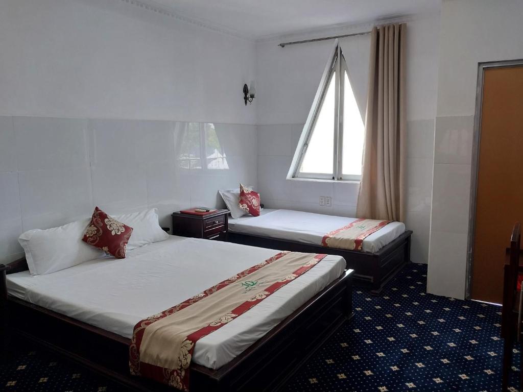 Nhat Quy Hotel - Quarto Triplo Com Varanda