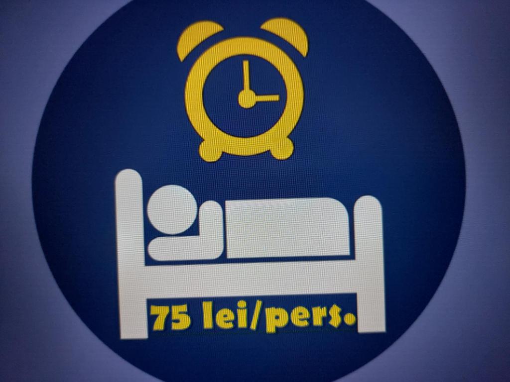 a sign with a bed and a clock on it at DOBRA GAZDA - transit sleep in Dobra