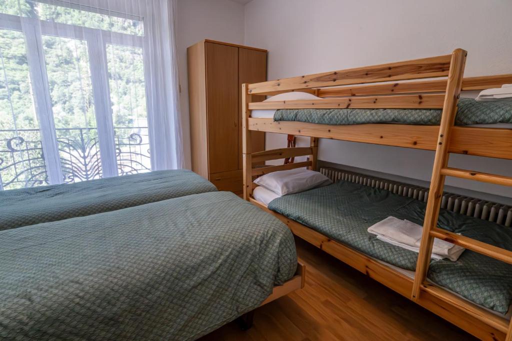 Postel nebo postele na pokoji v ubytování Albergo Stazione