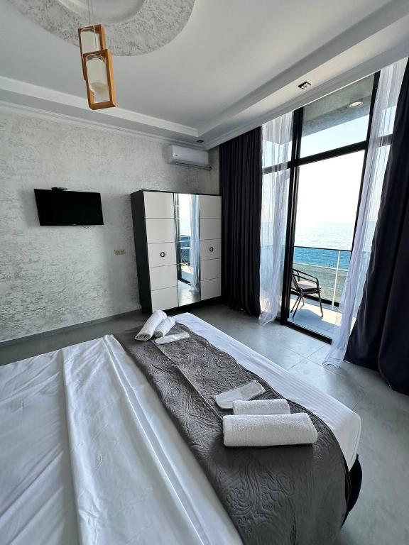 Postel nebo postele na pokoji v ubytování Hotel black sea