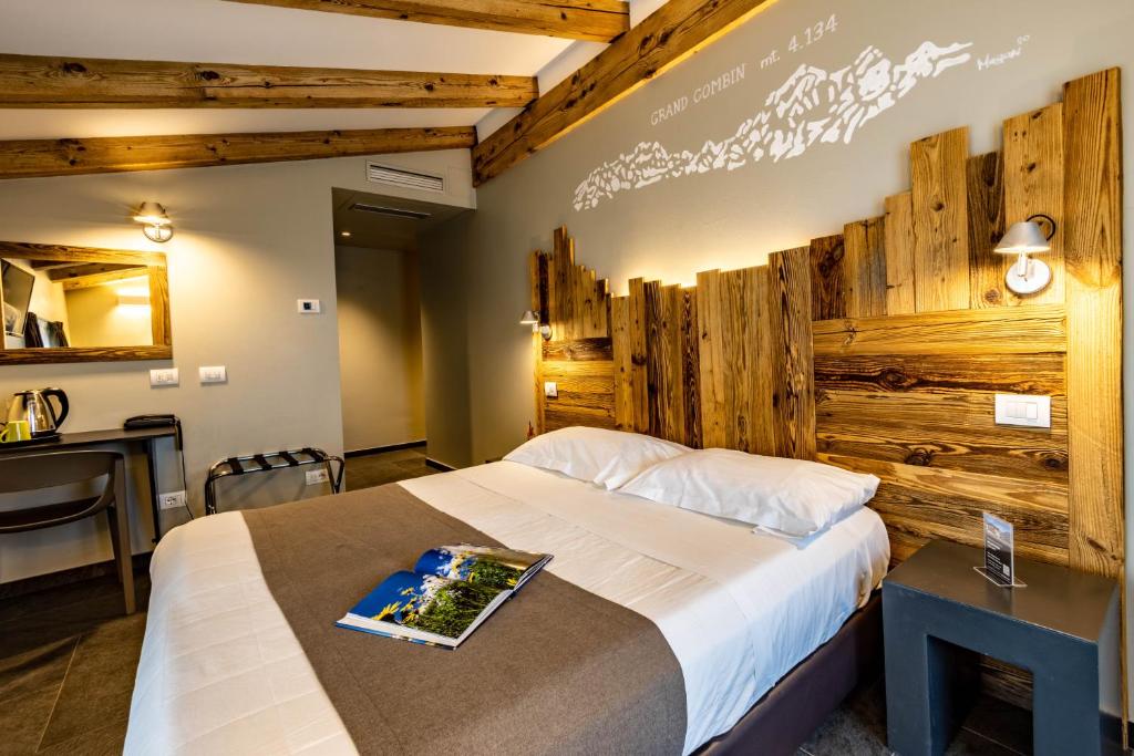 Postel nebo postele na pokoji v ubytování Monte Emilius