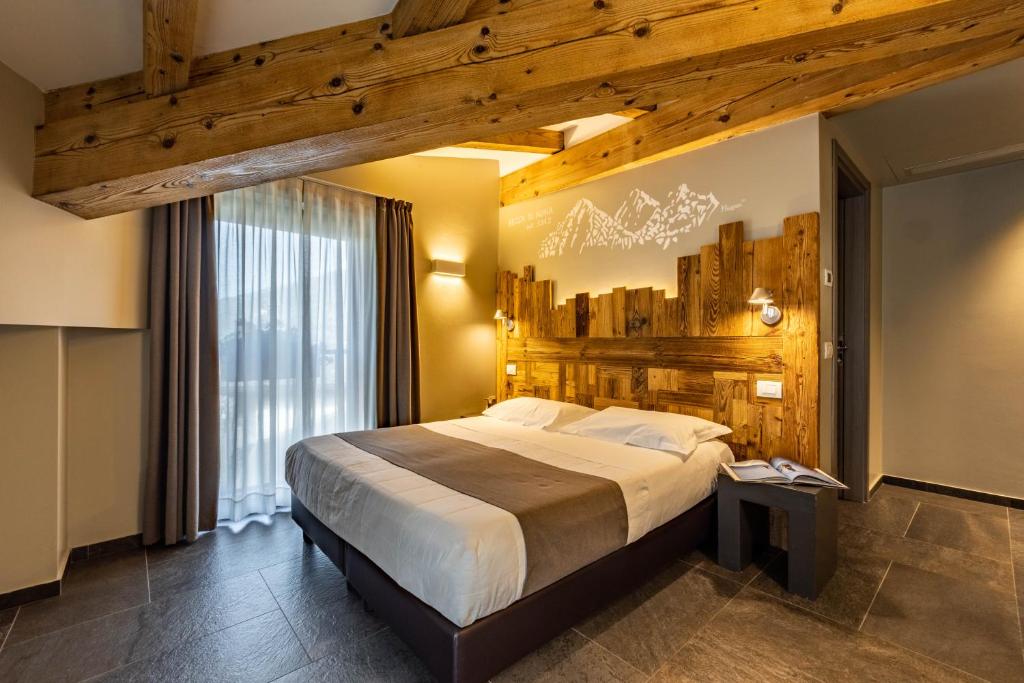 Postel nebo postele na pokoji v ubytování Monte Emilius