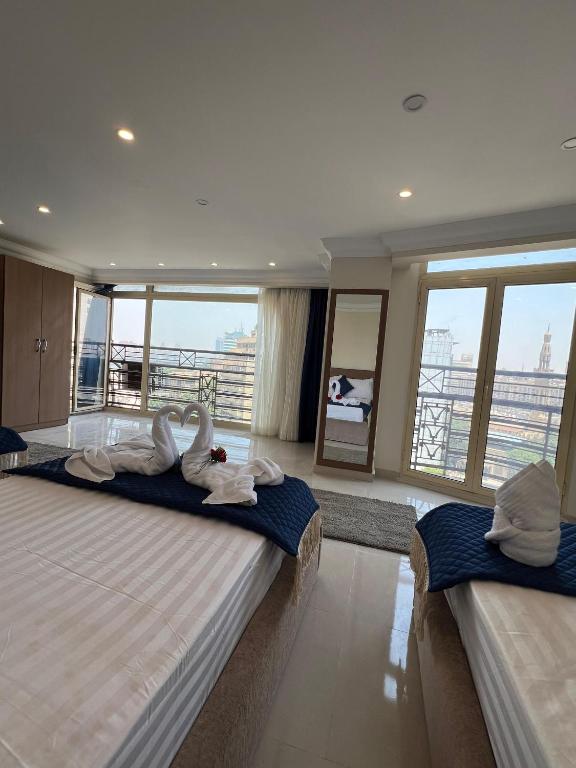Postel nebo postele na pokoji v ubytování Town Hotel Cairo