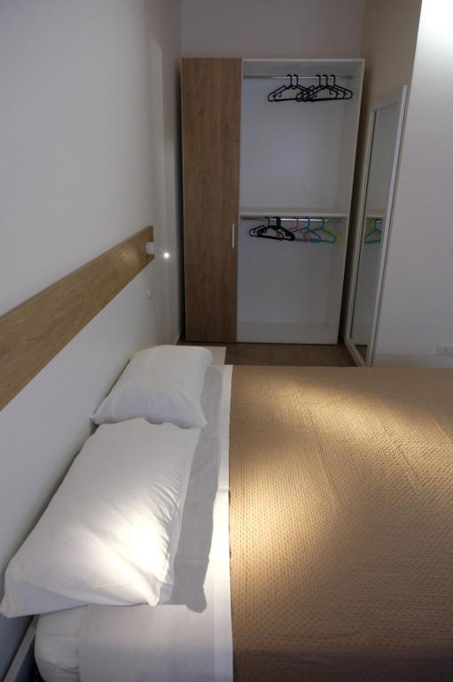 Postel nebo postele na pokoji v ubytování Salerno Rooms
