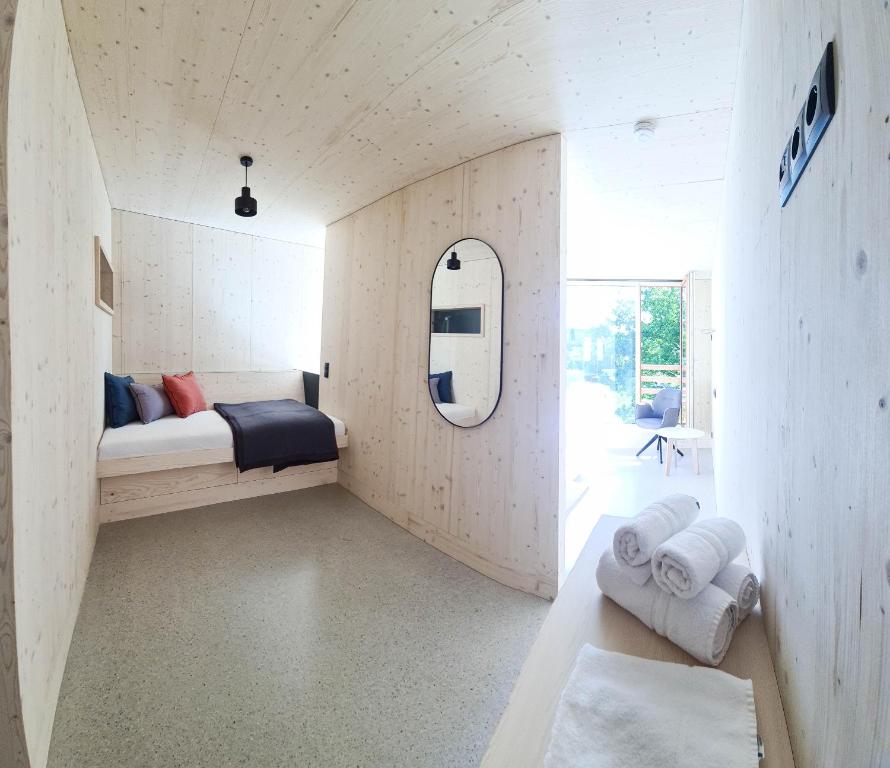 Postel nebo postele na pokoji v ubytování B&B Hotel Zimmerei mit Frühstück