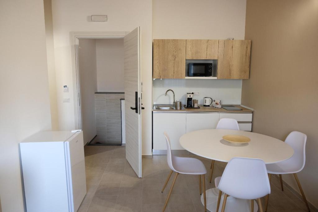 Kuchyň nebo kuchyňský kout v ubytování Salerno Rooms