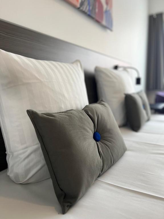 Postel nebo postele na pokoji v ubytování Cabinn Plus Esbjerg