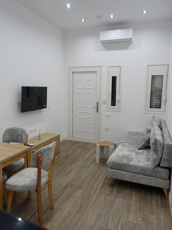 TV a/nebo společenská místnost v ubytování DEJA BLUE Cozy Apartments
