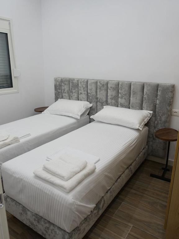 Postel nebo postele na pokoji v ubytování DEJA BLUE Cozy Apartments