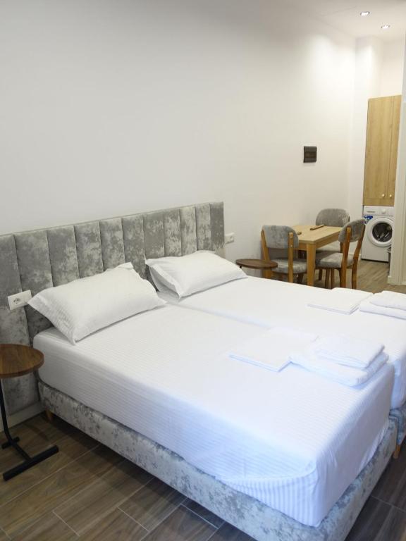 Postel nebo postele na pokoji v ubytování DEJA BLUE Cozy Apartments