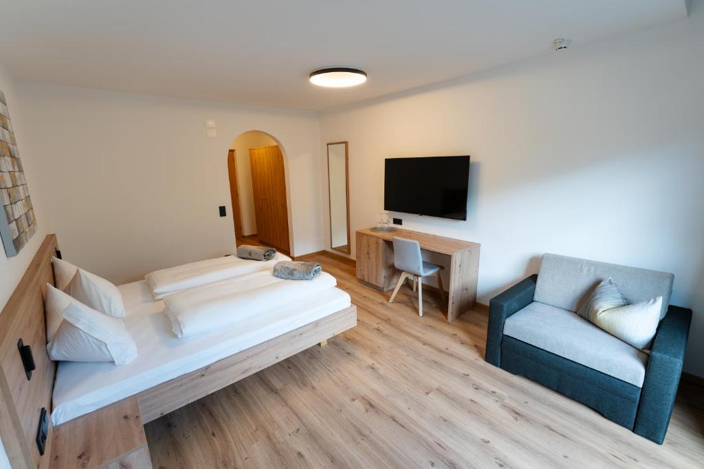 Postel nebo postele na pokoji v ubytování Self Service Hotel Schnalser Hof
