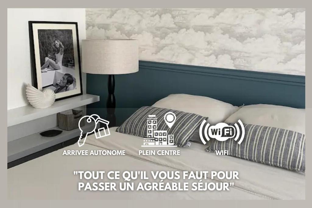 a poster of a bedroom with a bed with a cloud mural at Retour de plage Wimereux in Wimereux