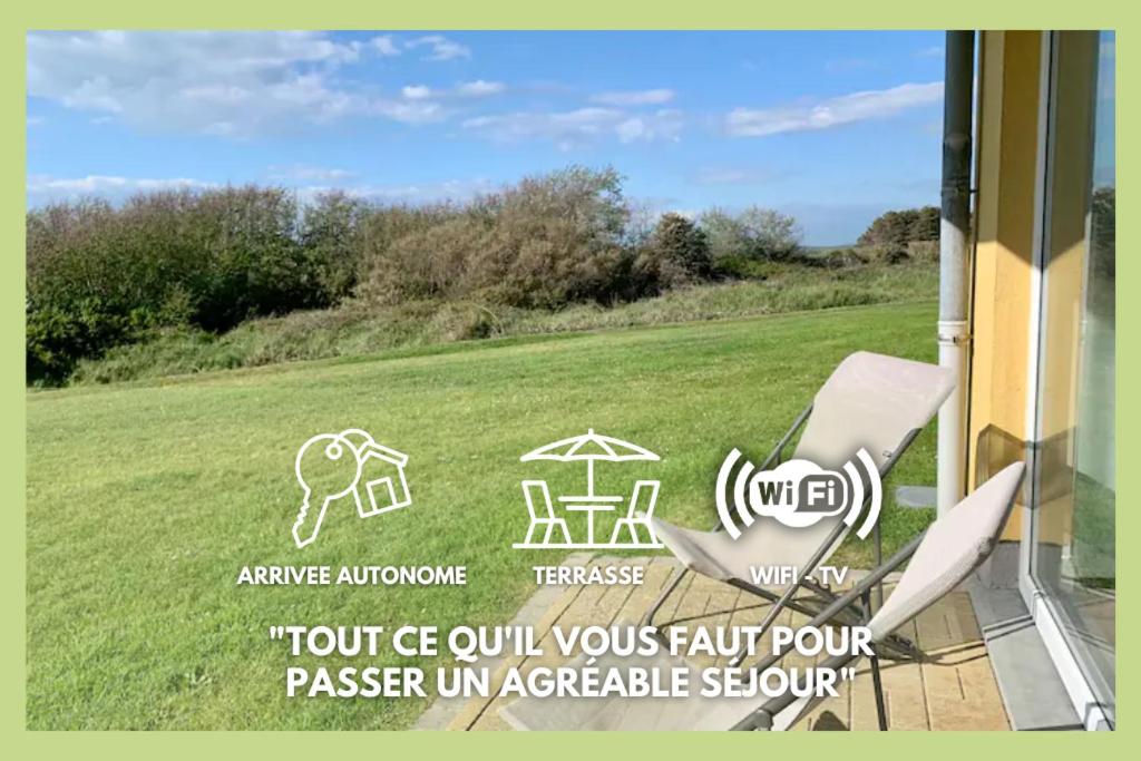 a window with a table and a chair in a field at Le Charmant, appartement situé dans la résidence de standing, les Dunes du Golf à Wimereux in Wimereux