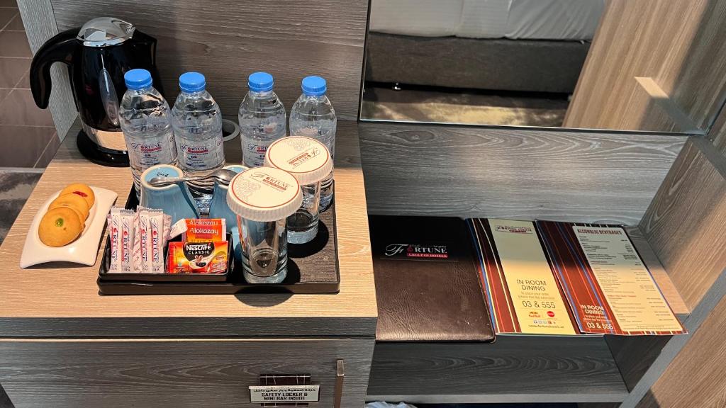 Kuchyň nebo kuchyňský kout v ubytování FORTUNE ATRIUM HOTEL