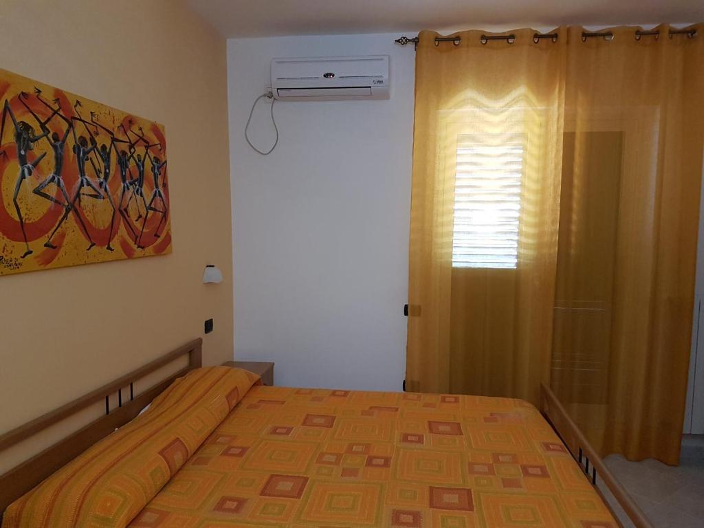 Postel nebo postele na pokoji v ubytování Hotel la Praia