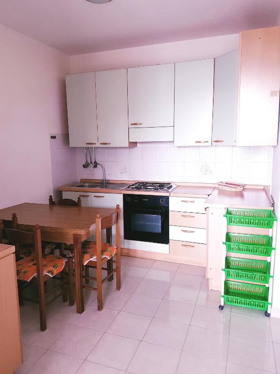 Kuchyň nebo kuchyňský kout v ubytování Hotel la Praia