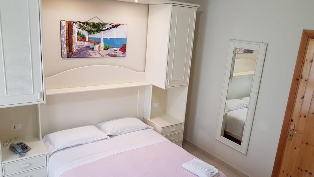 Postel nebo postele na pokoji v ubytování Hotel la Praia