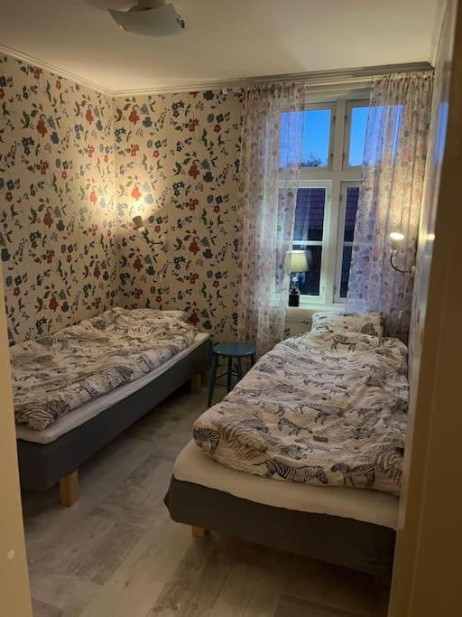 Postel nebo postele na pokoji v ubytování Böllingetorps gamla skola i Småland
