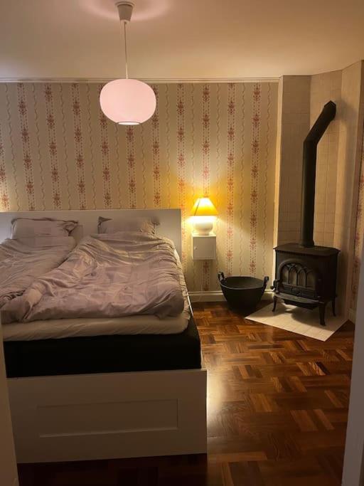 Postel nebo postele na pokoji v ubytování Böllingetorps gamla skola i Småland