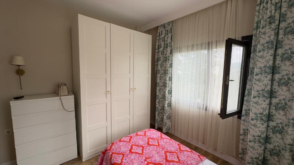 Postel nebo postele na pokoji v ubytování Zeytin Dalı Villa