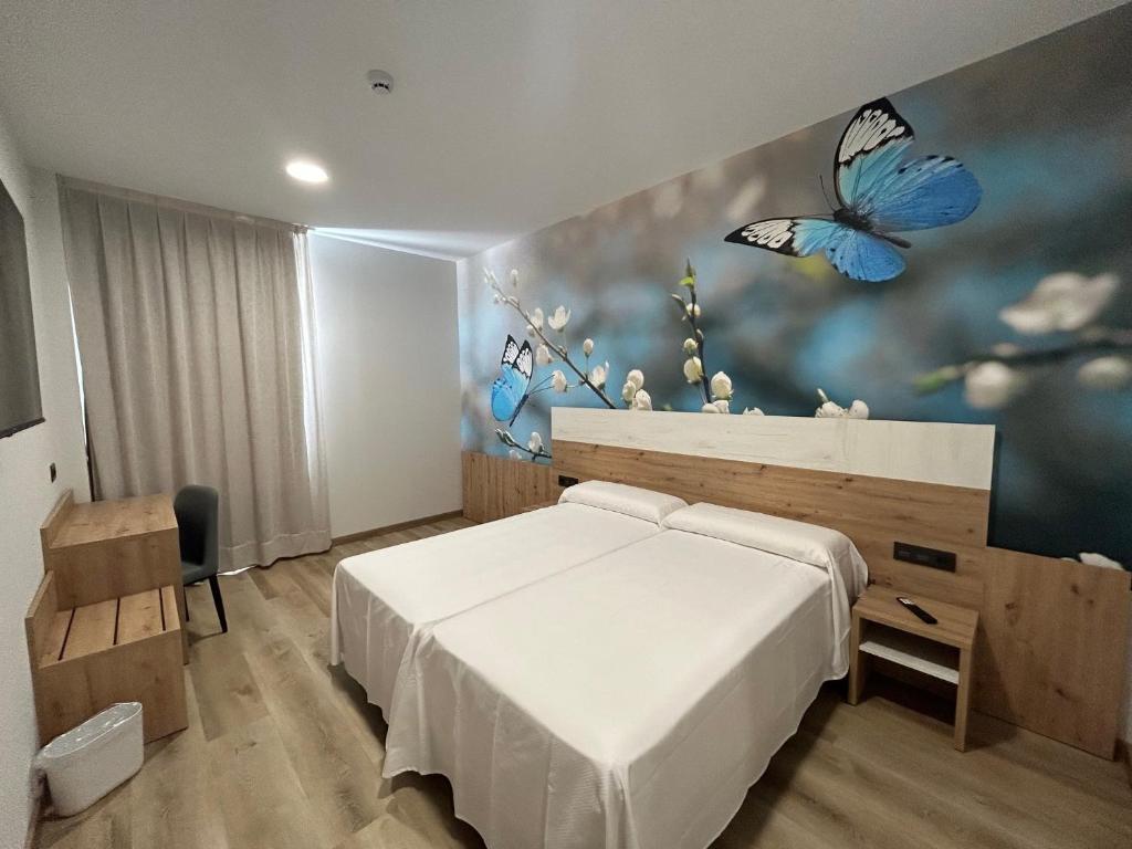 Postel nebo postele na pokoji v ubytování Hotel Javalambre