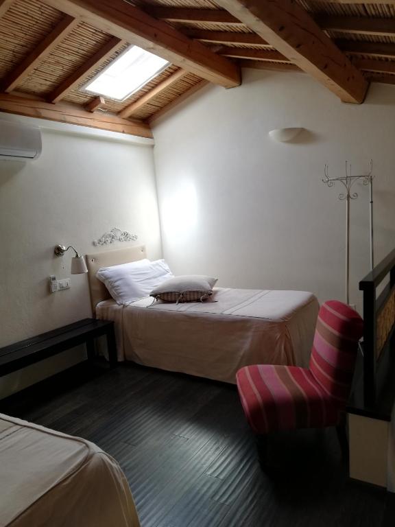 Postel nebo postele na pokoji v ubytování Aquae Sinis Albergo Diffuso