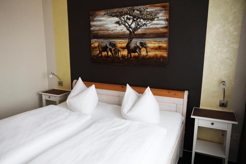 Voodi või voodid majutusasutuse Hotel Wandersleben - Erfurt toas