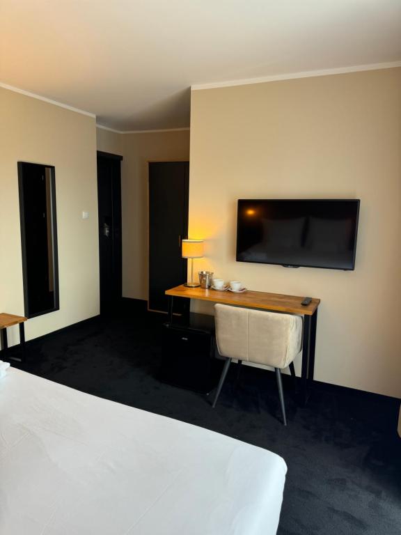 Postel nebo postele na pokoji v ubytování Amber Blue Wellness & SPA