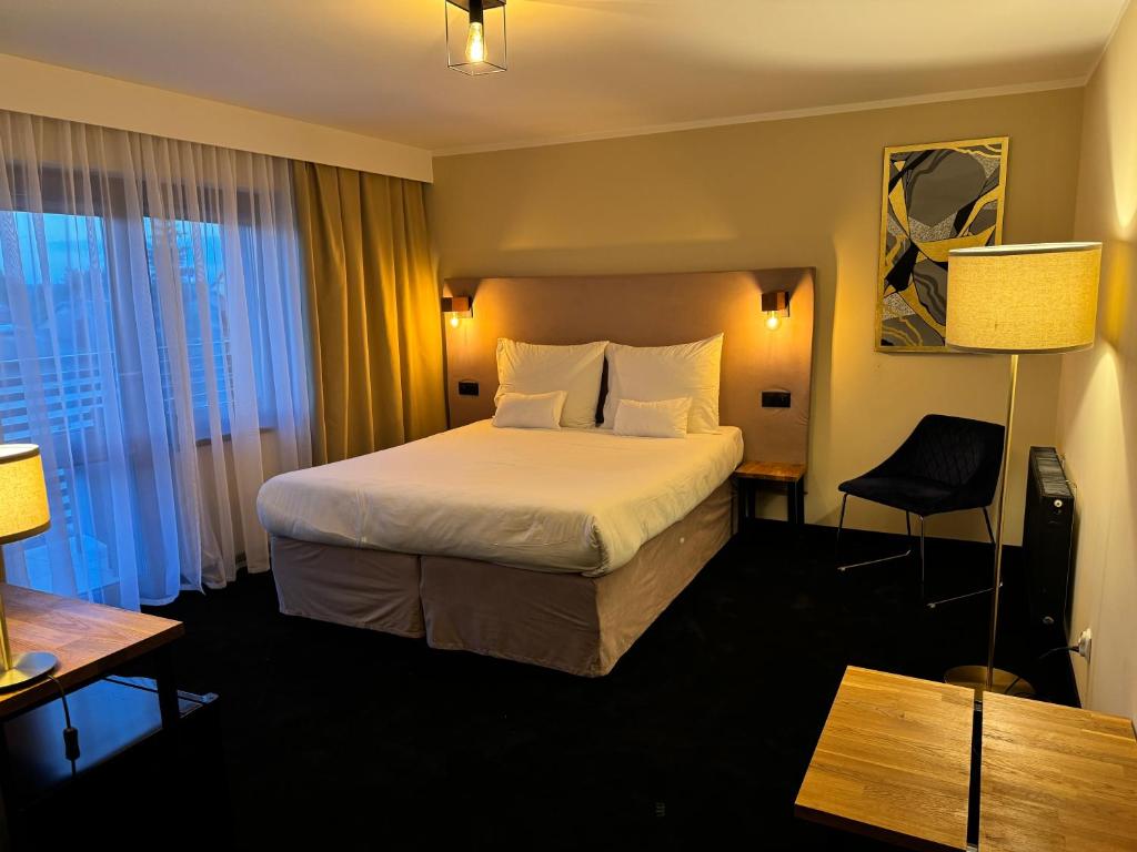 Postel nebo postele na pokoji v ubytování Amber Blue Wellness & SPA
