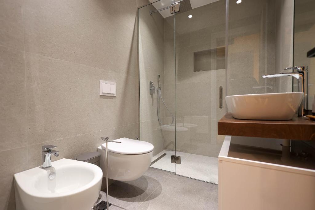 Koupelna v ubytování DeHa Rooms & Apartments