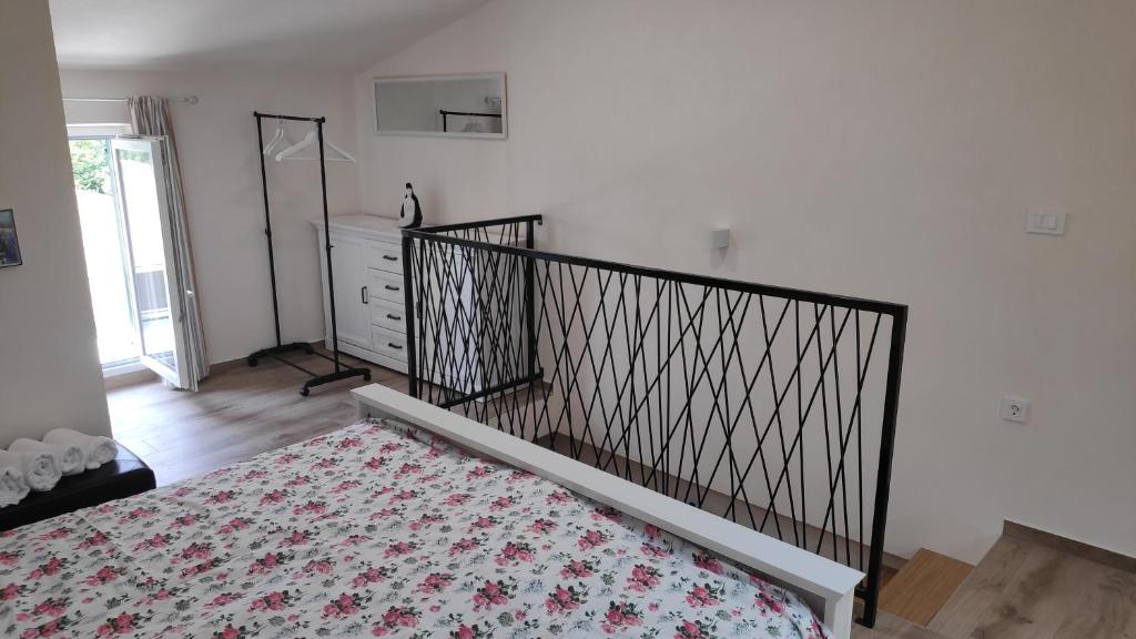 Postel nebo postele na pokoji v ubytování Perina hiža