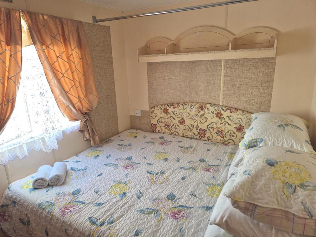 Postel nebo postele na pokoji v ubytování Vila Giruliai