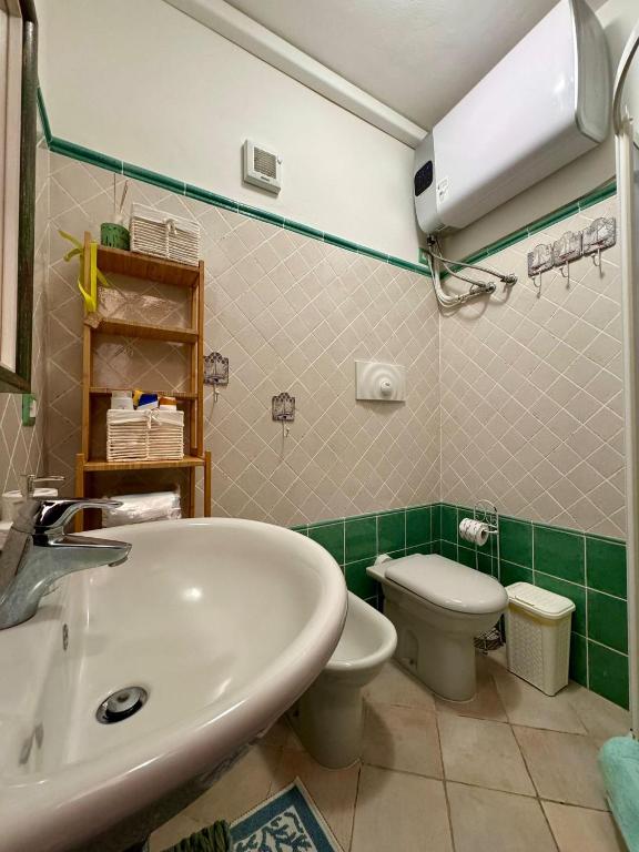 Koupelna v ubytování casa Wela