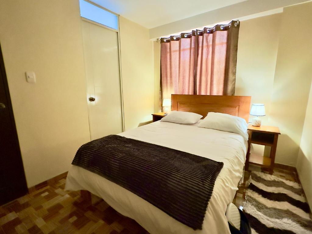 Postel nebo postele na pokoji v ubytování Casa Medina Hostal