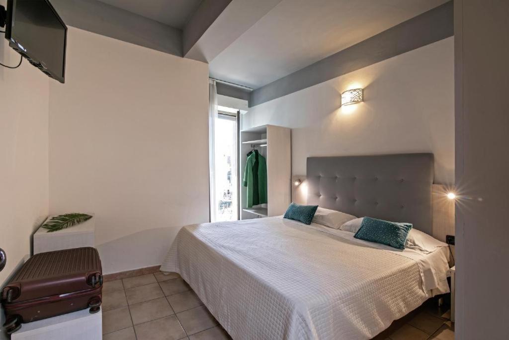 Postel nebo postele na pokoji v ubytování Hotel Noah