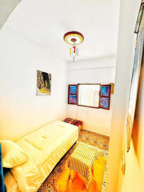 Postel nebo postele na pokoji v ubytování Hostel Tanger Medina