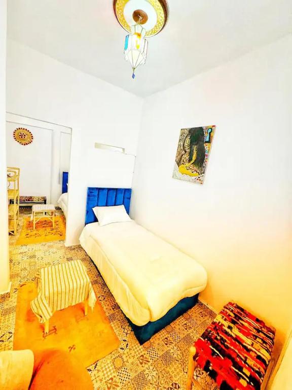 Postel nebo postele na pokoji v ubytování Hostel Tanger Medina