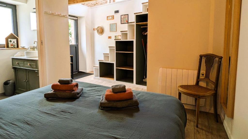 Postel nebo postele na pokoji v ubytování LA GUESTHOUSE - À deux pas du Sentier des Douaniers
