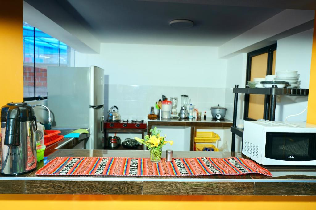 Kuchyň nebo kuchyňský kout v ubytování Casa Medina Hostal