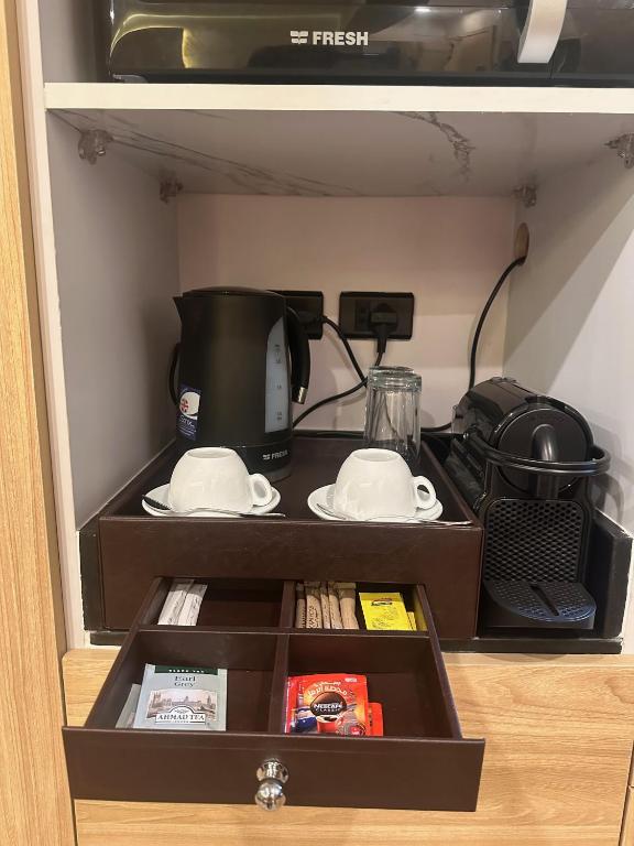 Kuchyň nebo kuchyňský kout v ubytování Lacasa Residence
