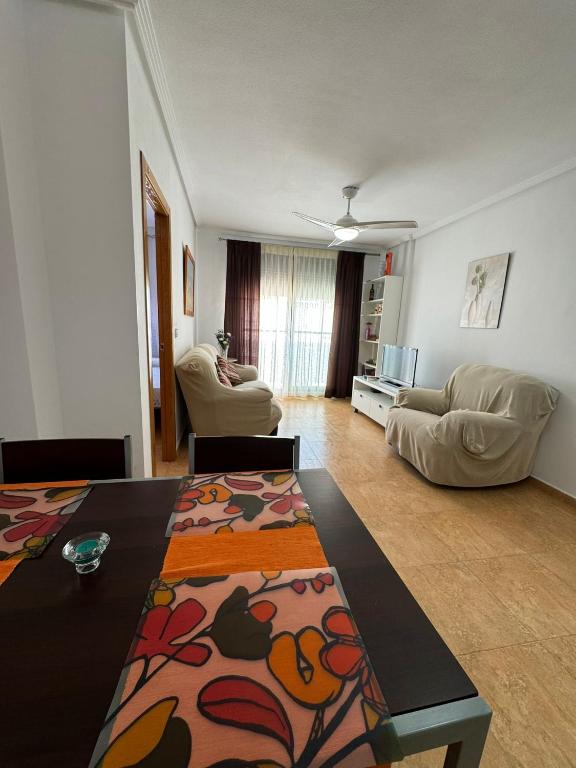 A seating area at Apartamento en Santiago de la Ribera a 3min de la playa