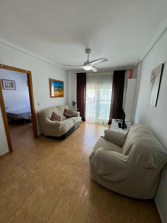 A seating area at Apartamento en Santiago de la Ribera a 3min de la playa