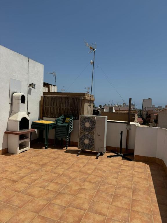 A balcony or terrace at Apartamento en Santiago de la Ribera a 3min de la playa