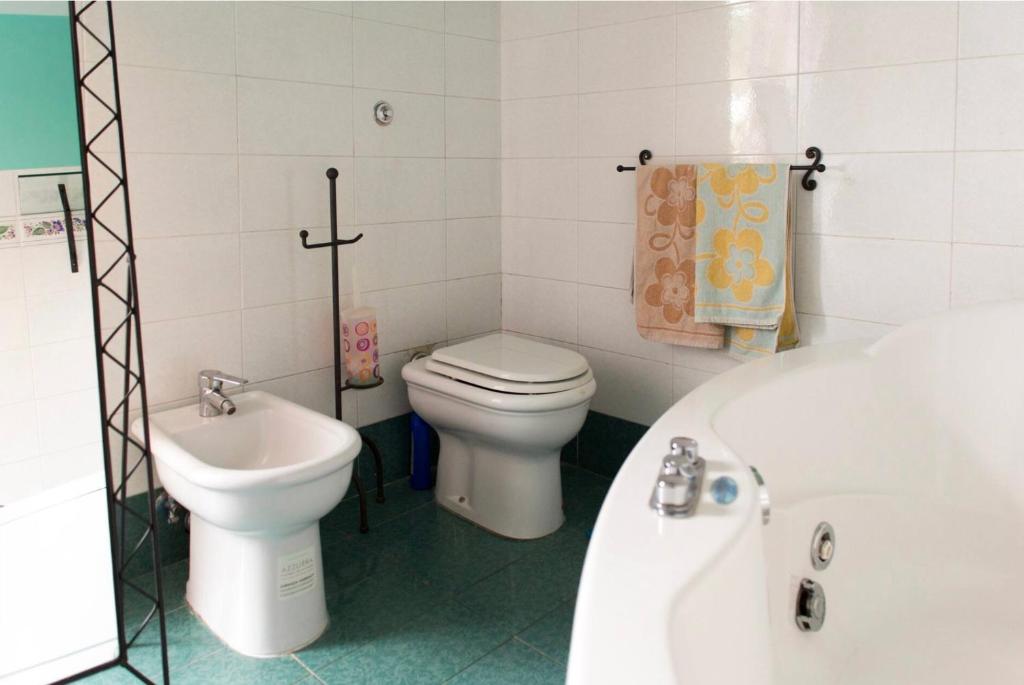 Koupelna v ubytování Camera privata con cucina