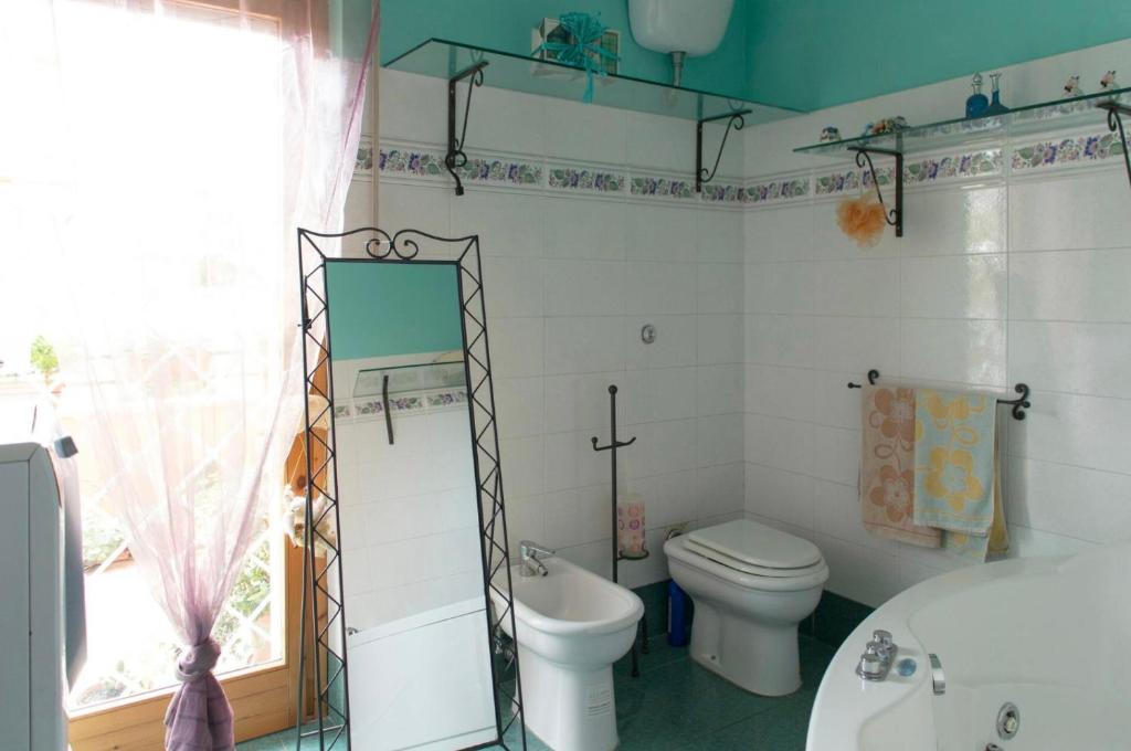 Koupelna v ubytování Camera privata con cucina