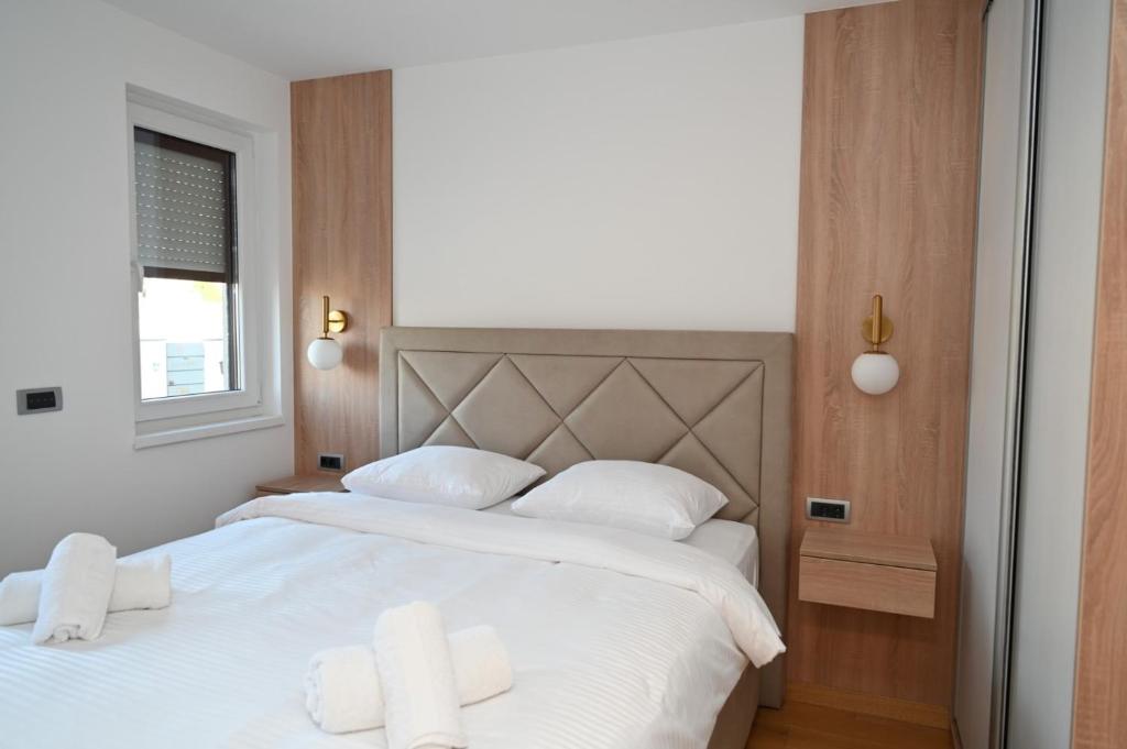 Postel nebo postele na pokoji v ubytování Apartman Vera 8 VRNJAČKA BANJA