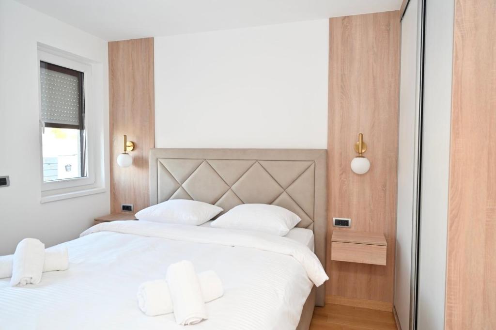 Postel nebo postele na pokoji v ubytování Apartman Vera 8 VRNJAČKA BANJA